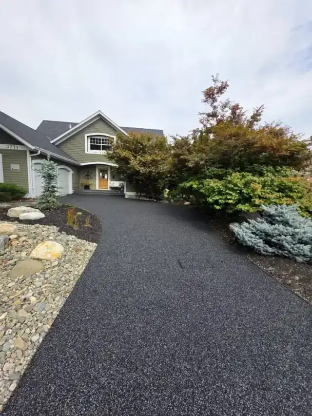 Premium rubber paved driveway in Kamloops, BC at golden hour